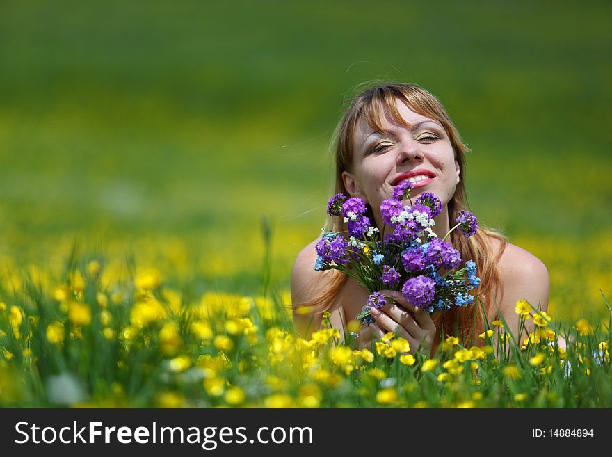 The girl with a bunch of flowers