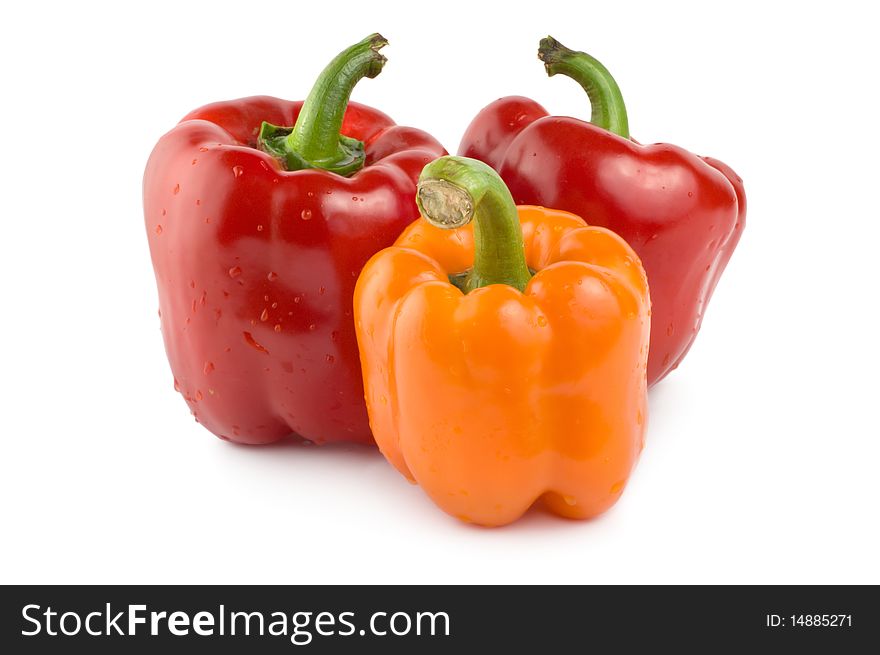 Orange and red pepper isolated on white background. Orange and red pepper isolated on white background