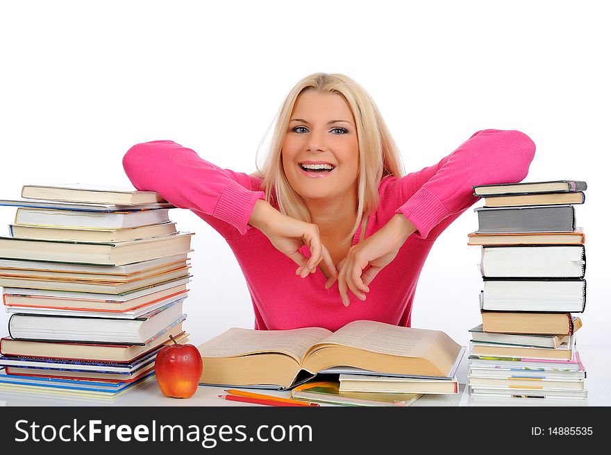 Young student girl with lots of books