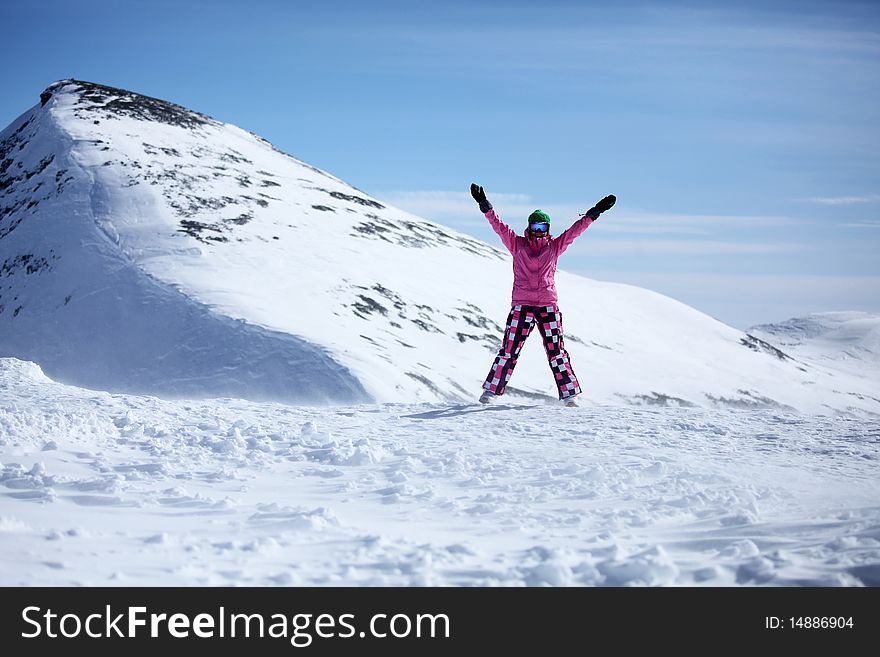 Snowboarder on top of the mountain