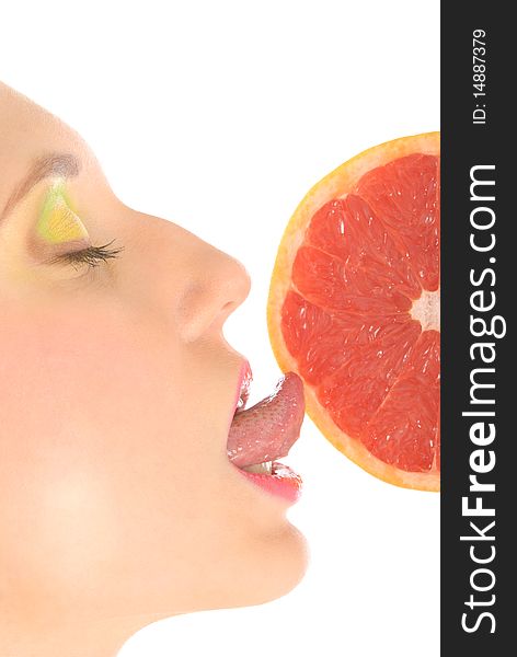 Woman With Make-up Licks Grapefruit