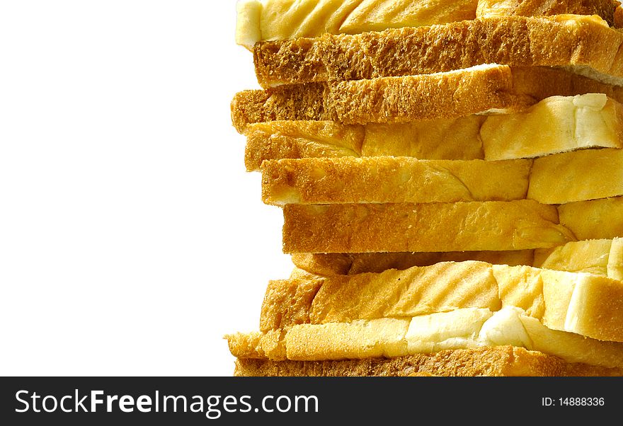 Pieces of bread on white background
