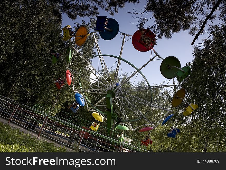 Carousel rotation in park amusement
