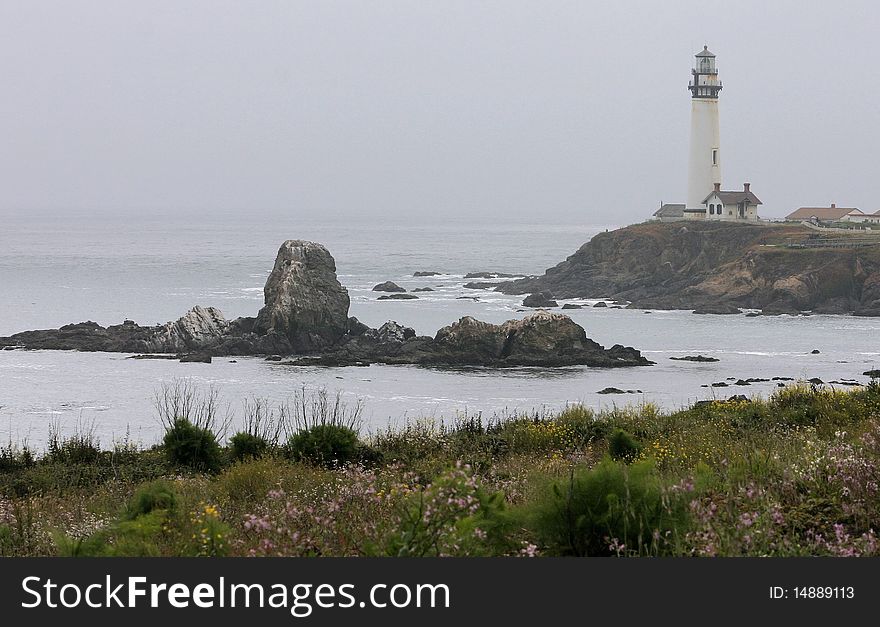 Pigeon Point Lighthouse in California on an overcast afternoon