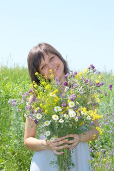 The Girl Collects A Flowers Stock Photo The Girl Collects A Flowers Stock Photo