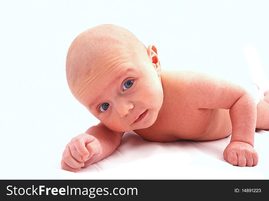 The small newborn child on a white background