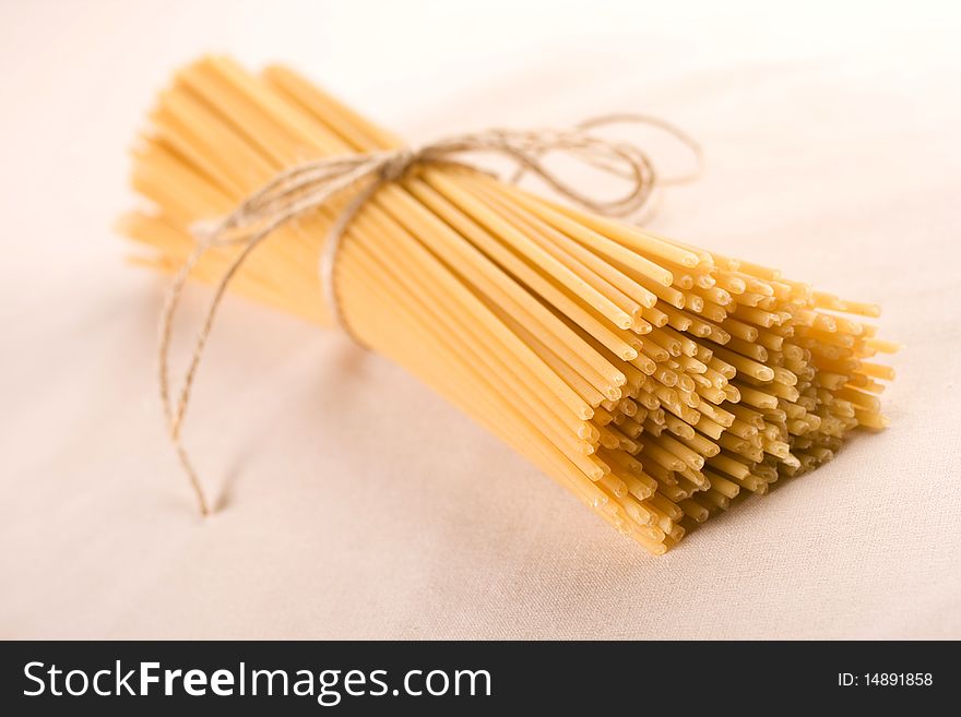 Italian long spaghetti pasta over white