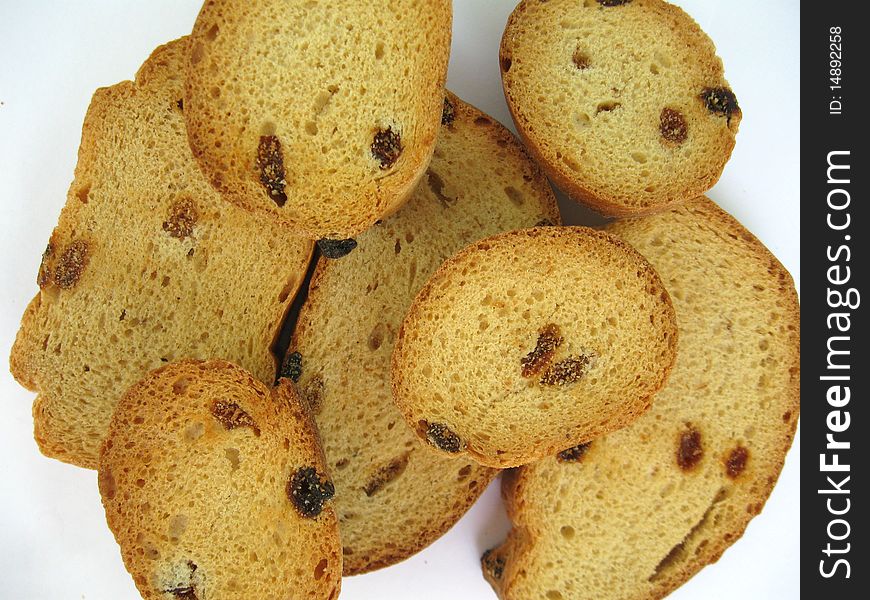 The photo shows sweet crackers with raisins. The photo shows sweet crackers with raisins