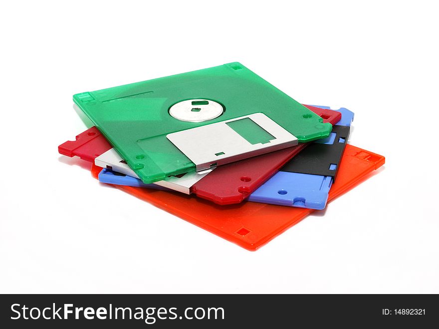 Four color diskettes on a white background