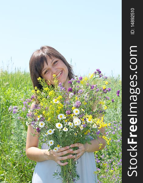 The girl collects a flowers