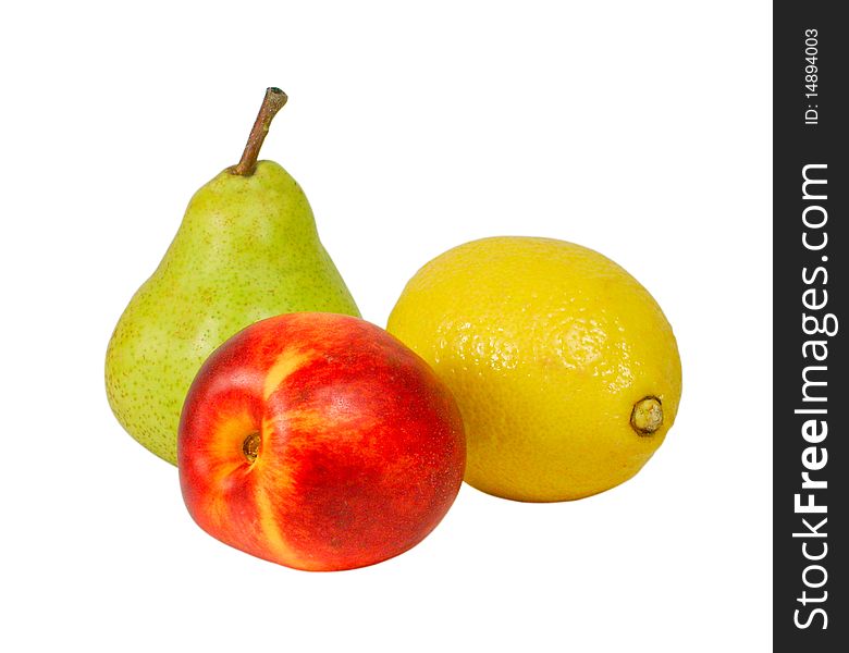 Pear, nectarine and lemon on a white background. Pear, nectarine and lemon on a white background