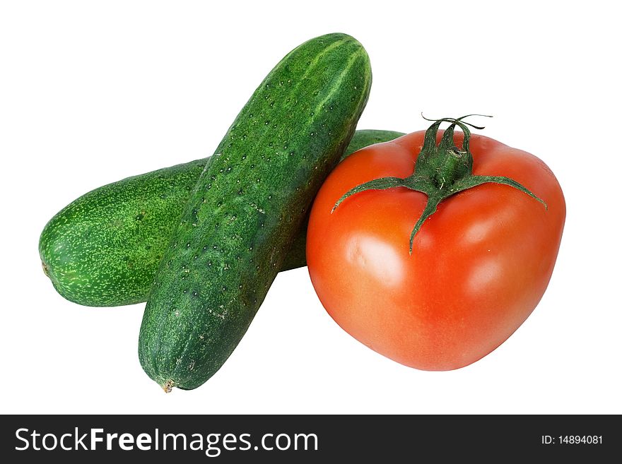 Vegetables - cucumbers and tomato it is isolated on white background