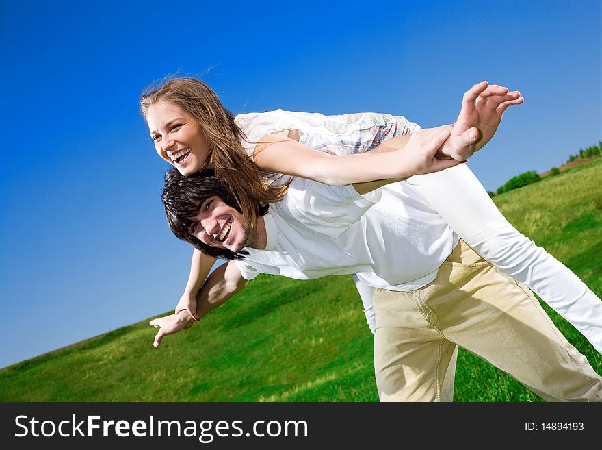 Long-haired girl and boy with smile
