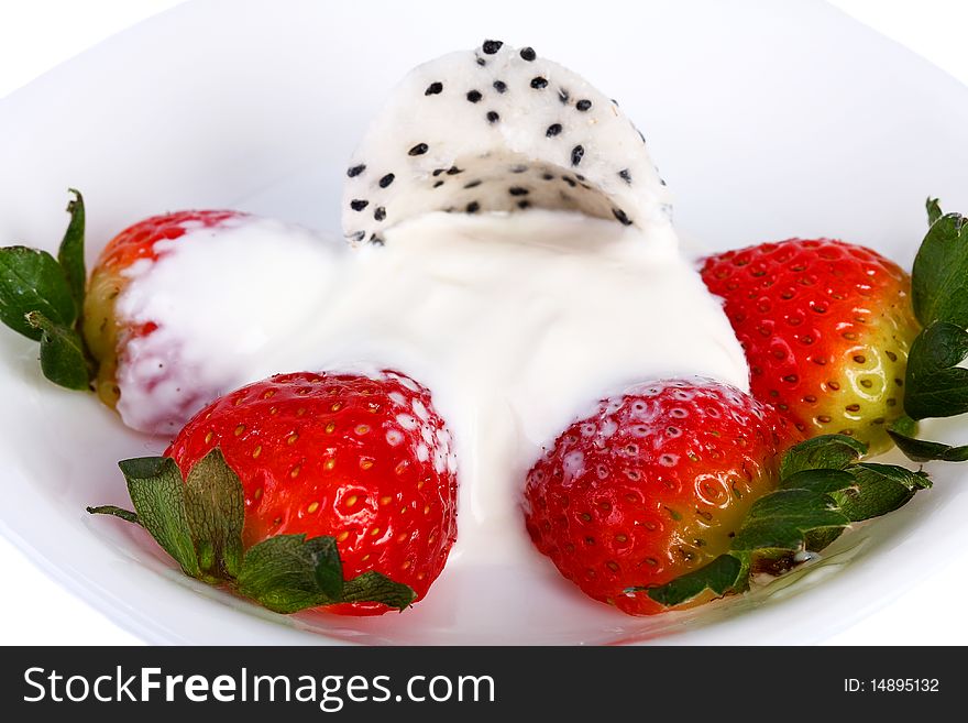 Strawberries and cream Pitahaya on a white plate