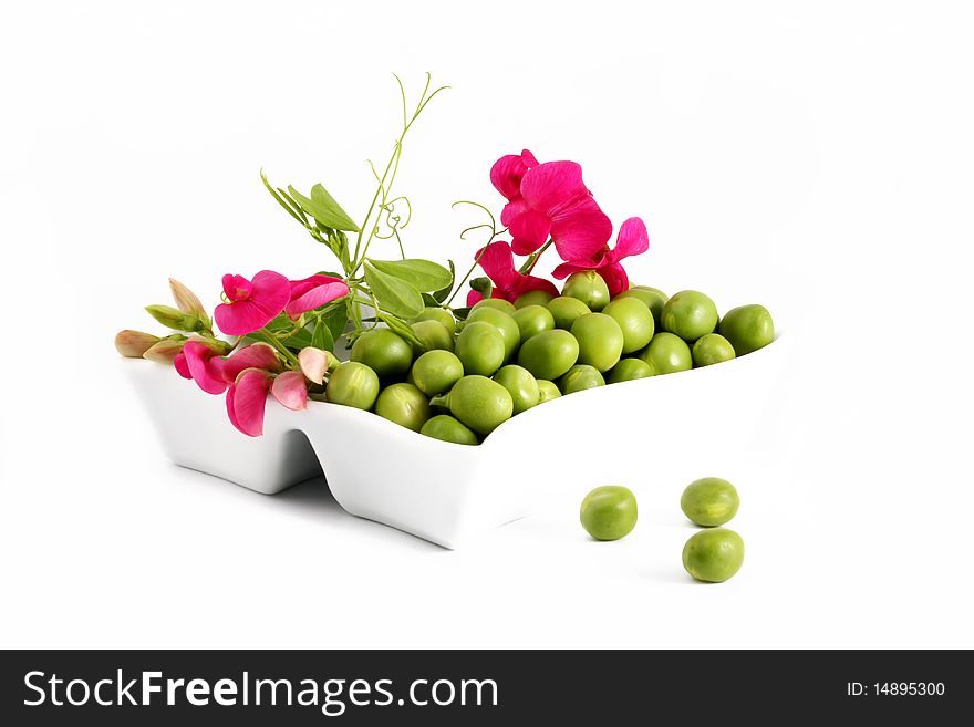 Green peas on a white background