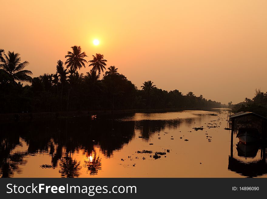 Sun setting hours at backwater regions of Kerala, India. Sun setting hours at backwater regions of Kerala, India.