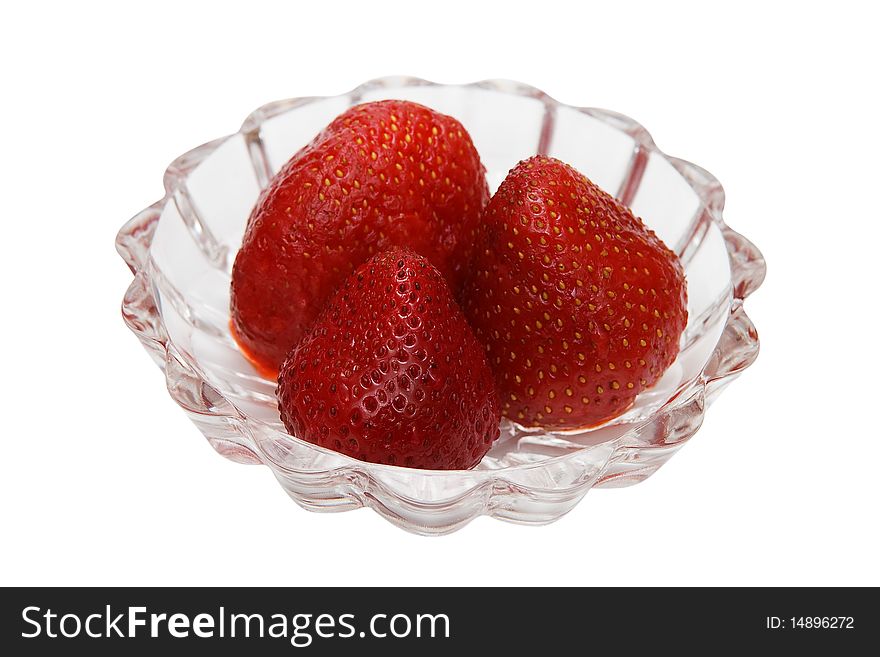 Strawberry in glass plate isolated on white background