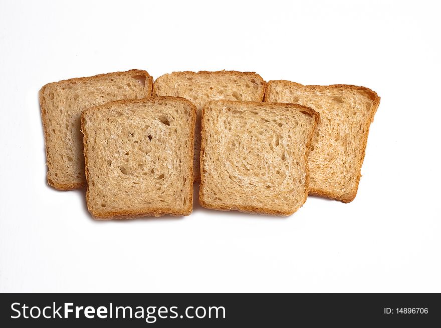 Slices of white bread on a white background