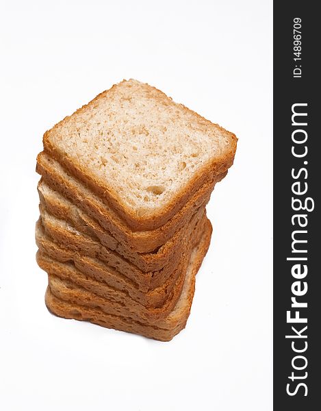 Slices of white bread on a white background