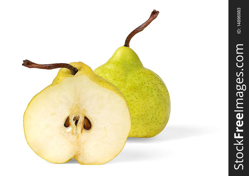 Yellow pear and a half over white background. Yellow pear and a half over white background