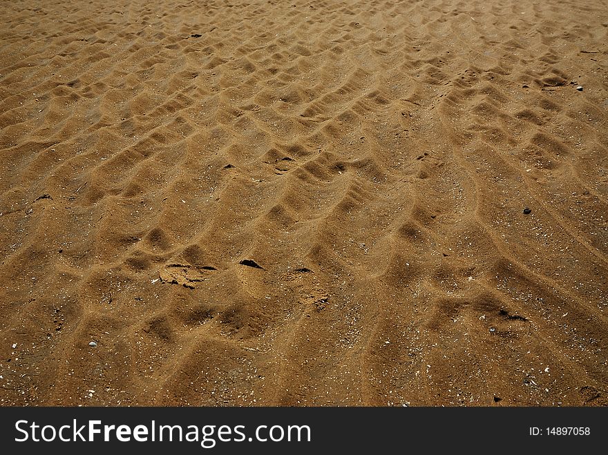 Sea washed beach sand patterns