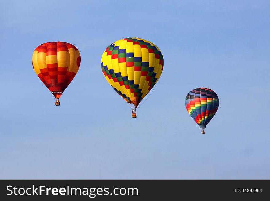 Colorful hot air balloon with blue sky background. Colorful hot air balloon with blue sky background