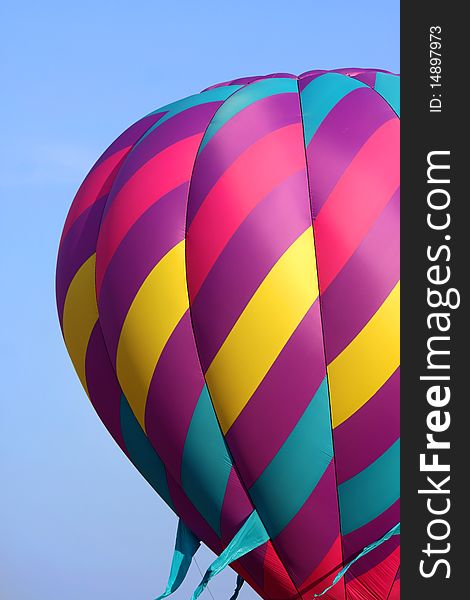 Colorful hot air balloon with blue sky background. Colorful hot air balloon with blue sky background