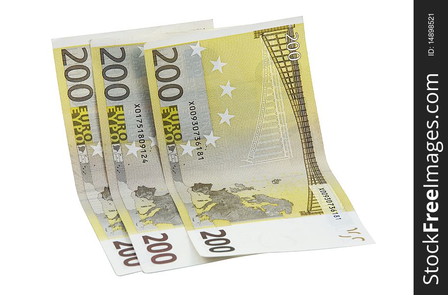 Three 200 euro banknotes isolated over white background. Three 200 euro banknotes isolated over white background