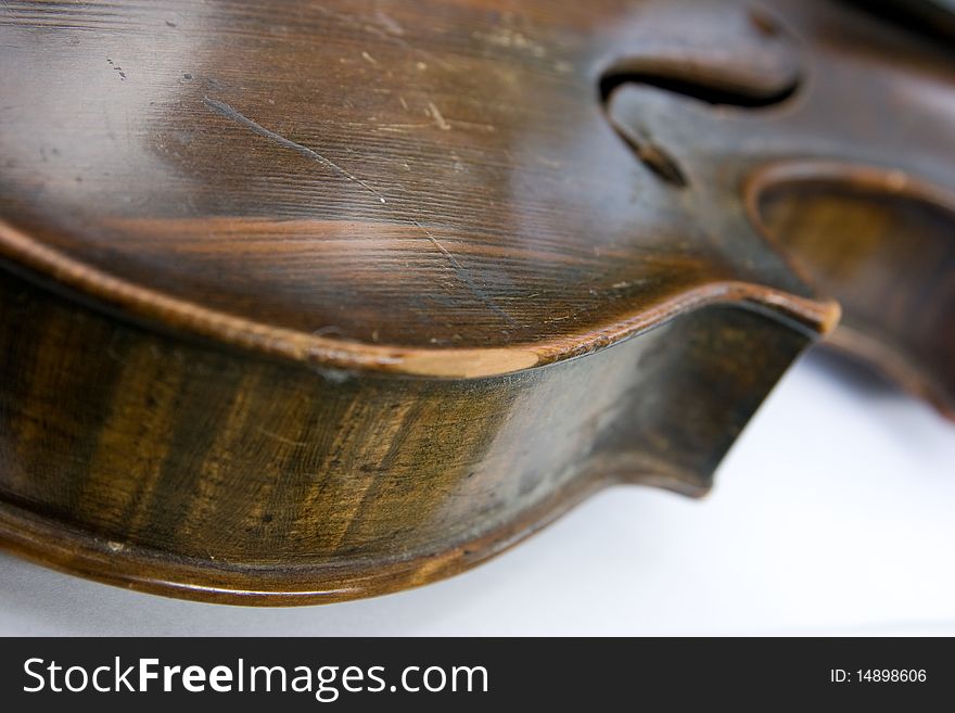 Old violin on white background