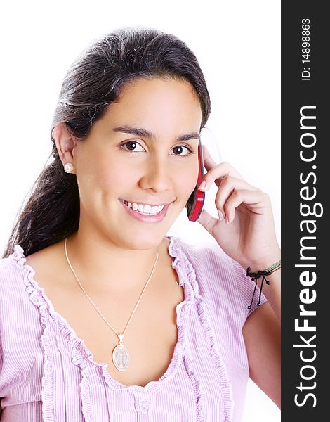 Young girl talking on her cell phone. White Background. Young girl talking on her cell phone. White Background