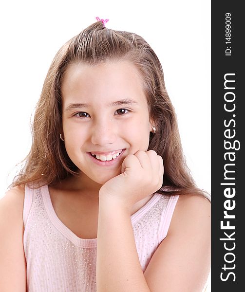 Girl smiling and looking at the camera over white background. Girl smiling and looking at the camera over white background