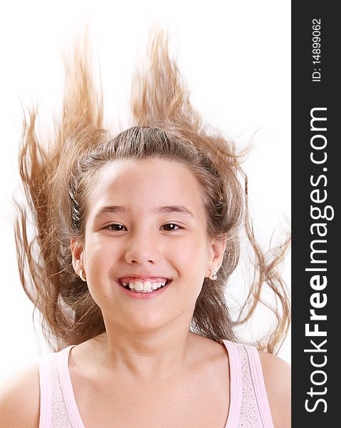 Ten years old girl with hair up over white background. Ten years old girl with hair up over white background