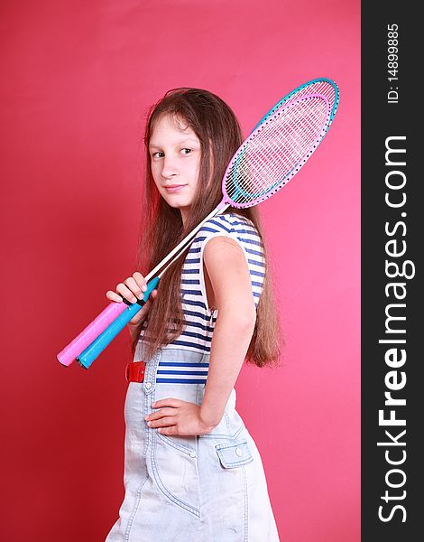 Portrait of sporty teen girl with badminton rackets. Portrait of sporty teen girl with badminton rackets