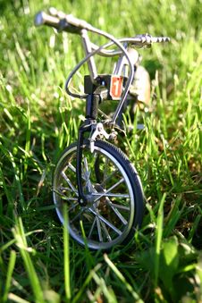 Bicycle In A Grass Stock Photos