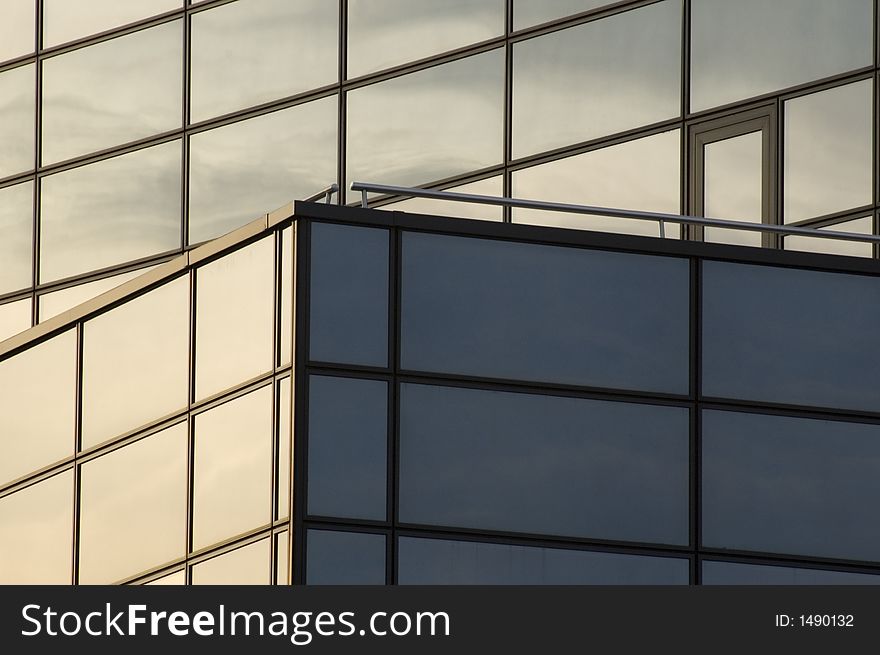 Abstract reflecting windows on large business building