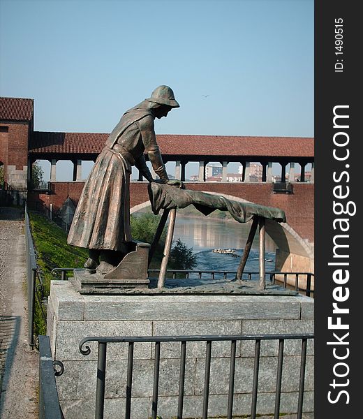 Pavia, Italy, woman that is washing the clothes, november 2006