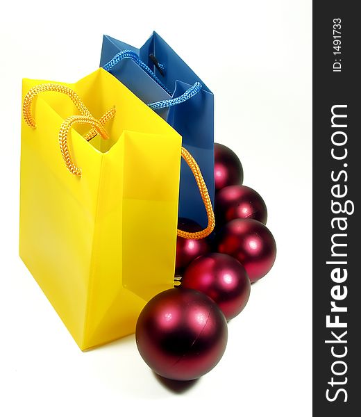 Blue and yellow bags whit red balls