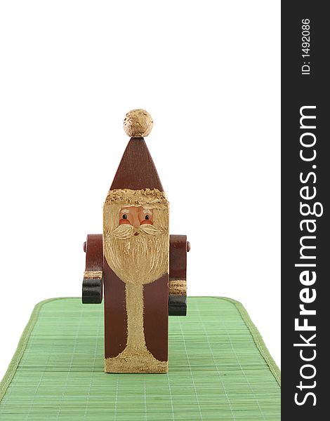 Father Christmas figure on a green mat