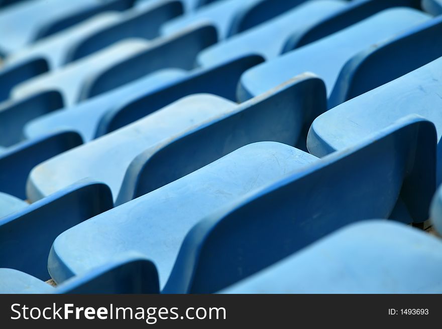 Empty stadium with blue seats