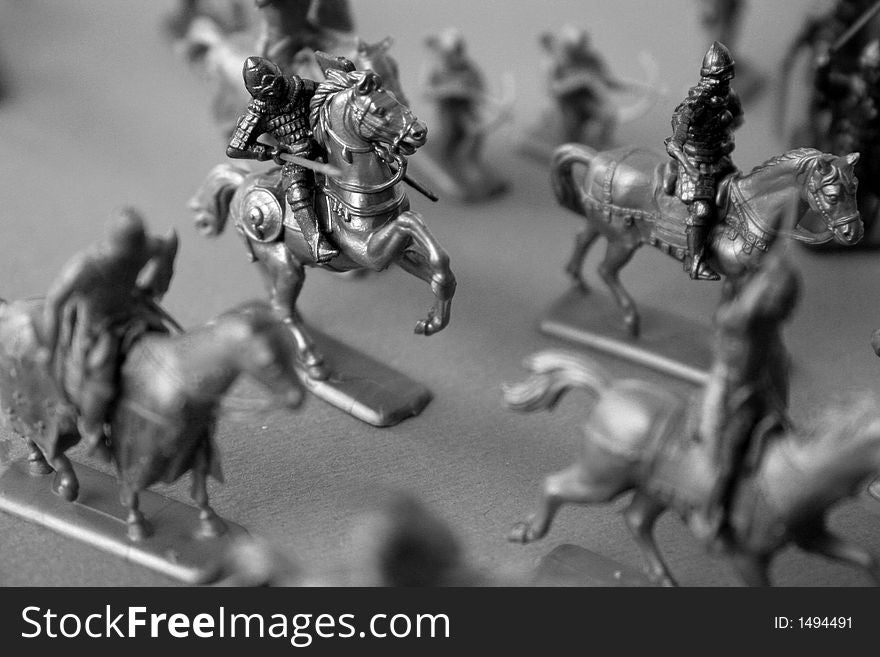 Toy plastic soldiers in black and white