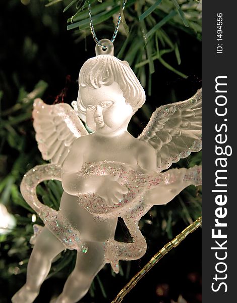 Crystal angel decoration hanging on a christmas tree