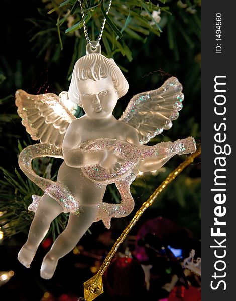 Crystal angel decoration hanging on a christmas tree