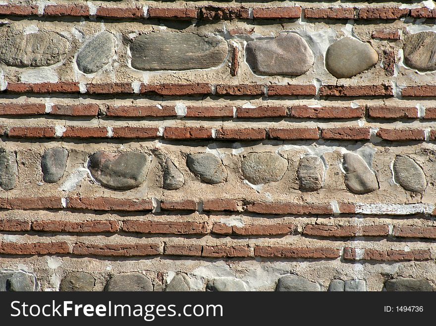 Ancient red brick wall with pattern. Ancient red brick wall with pattern