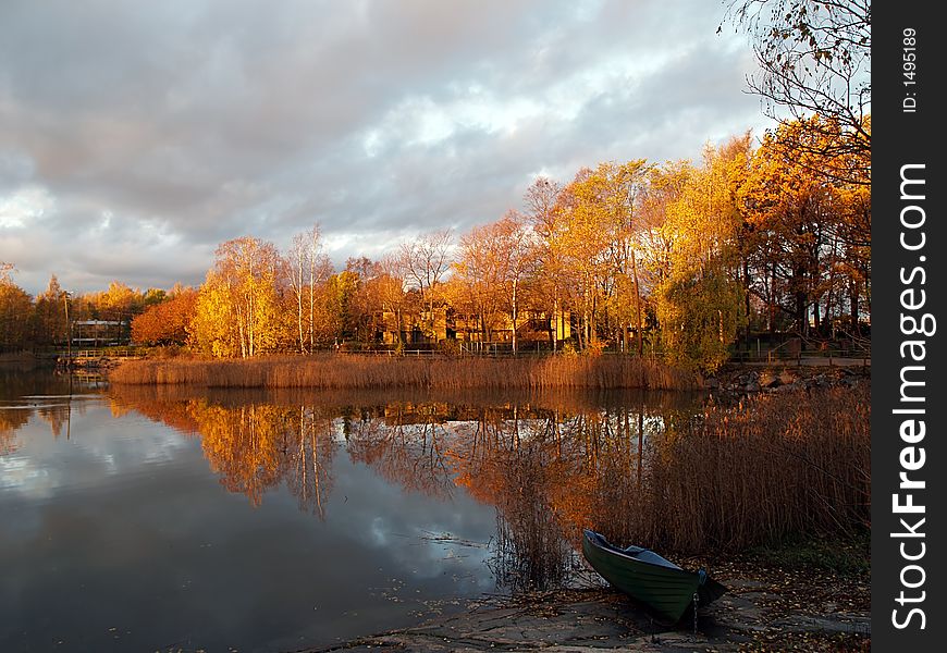 Reflections Of Trees And Clouds On Water