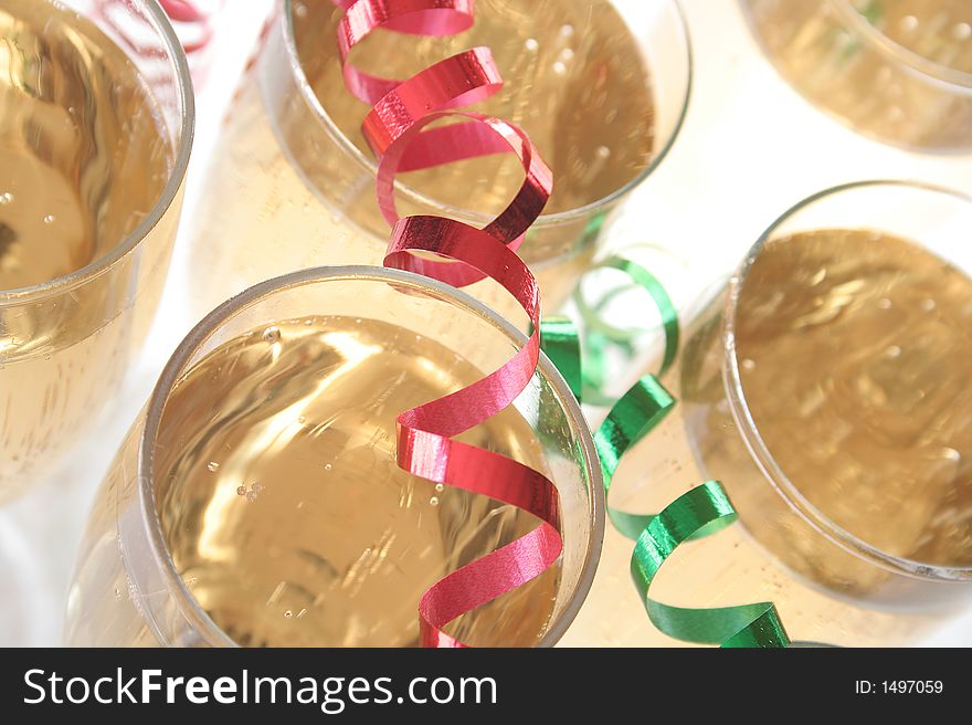 Wine glasses with ribbons and confetti. Wine glasses with ribbons and confetti