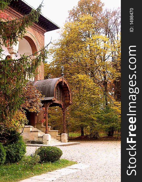 PAth to entrance of the brick house in Curtea de Arges Monastery park - Romania. An imppresive relgious monument finished in 7 january 1517 by Neagoe Basarab