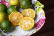 Limes In A Plate Royalty Free Stock Image