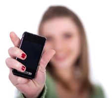 Female Showing Her Cell Phone Royalty Free Stock Images