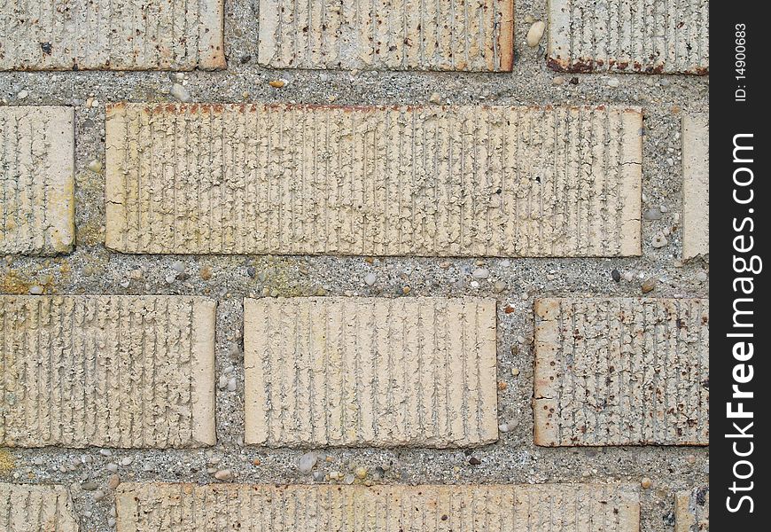 Close up shot of brick and mortar texture with a rough, striped surface. Close up shot of brick and mortar texture with a rough, striped surface.