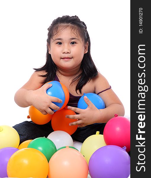 Happy asian cute girl playing with balloons. Happy asian cute girl playing with balloons